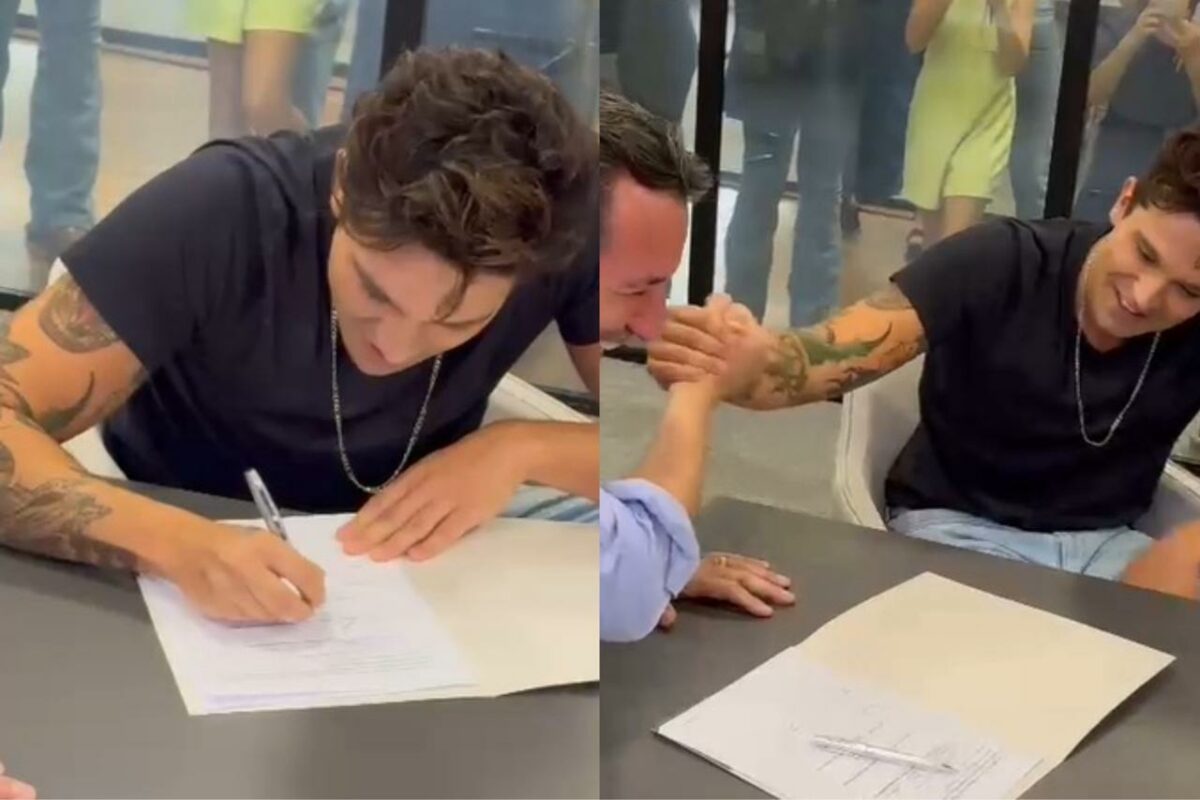 Luan Santana assinando contrato no agronegócio. (Foto: Reprodução)