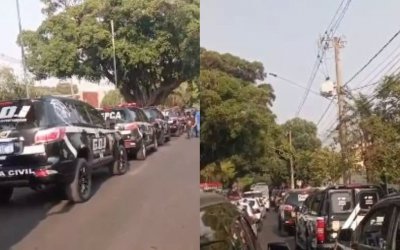 Policiais protestam com máscaras e são retirados de desfile